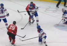 US defeats Canada in overtime to win Olympic men’s hockey gold